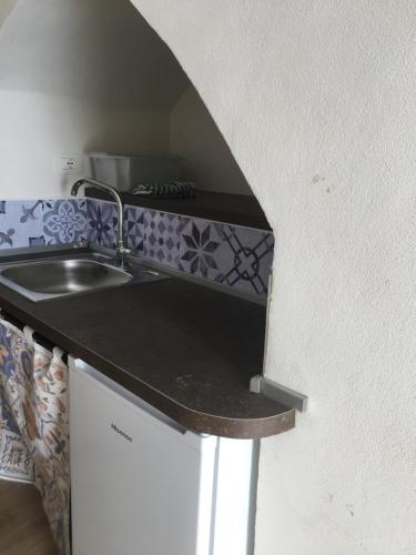 Η κουζίνα ή μικρή κουζίνα στο Correri 125