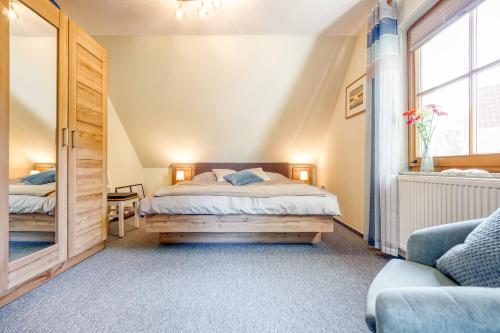 Katil atau katil-katil dalam bilik di Ferienpark Freesenbruch Wohnung 2 6 - Windrose