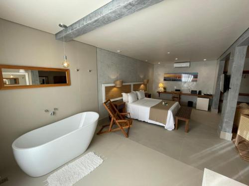 Uma área de estar em Hiu Hotel