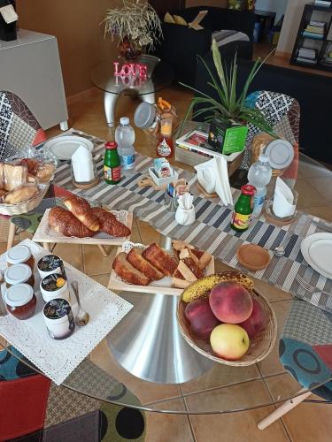 a table topped with lots of different types of food at Il Faggio 17 B&B in Artena