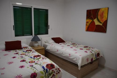 Lova arba lovos apgyvendinimo įstaigoje Quinta Azul