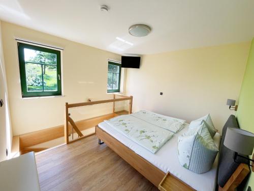 Postel nebo postele na pokoji v ubytování Ferienwohnung May