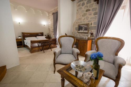 Postel nebo postele na pokoji v ubytování Hotel Villa Duomo