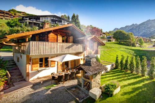 an aerial view of a house with a garden at Chalet Le Petit Mazot - OVO Network in La Clusaz