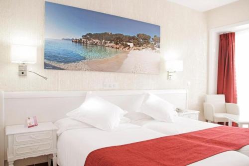 Hotel Bella Playa & Spaにあるベッド