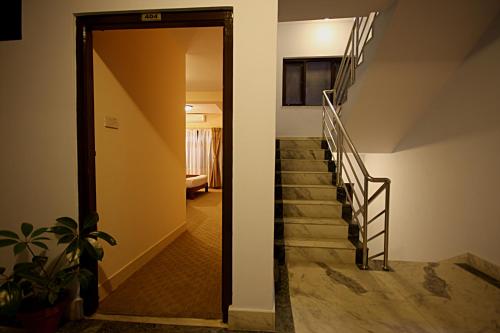a stairway leading to a room with a hallway at Thamel Grand Hotel in Kathmandu