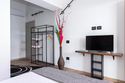 Televisyen dan/atau pusat hiburan di Living G Room