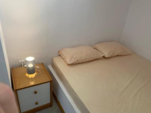 Postel nebo postele na pokoji v ubytování Lovely Flat With Amazing View