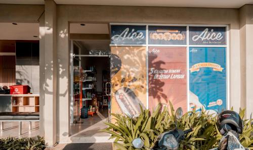 a store front with a display window of a store at The Rooms Apartment Bali by ARM Hospitality in Denpasar