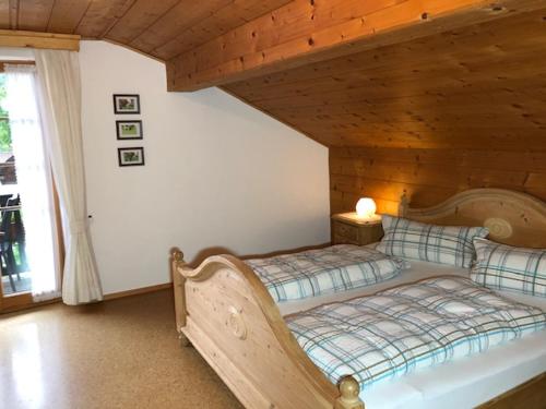 Postel nebo postele na pokoji v ubytování Haus Schaffler