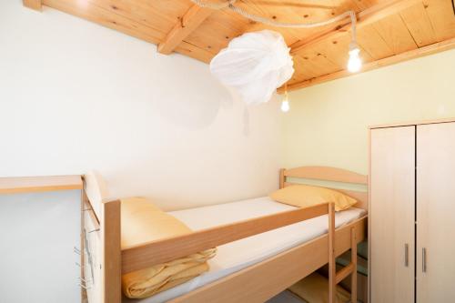 a room with two bunk beds in it at Villa Anita in Vela Luka
