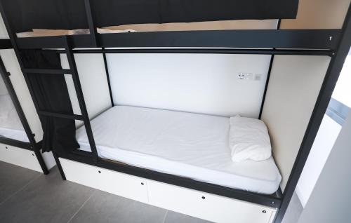 Postel nebo postele na pokoji v ubytování Hostel MYD La Latina