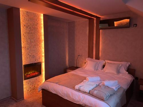 Postel nebo postele na pokoji v ubytování Apartmani Aso-Ler