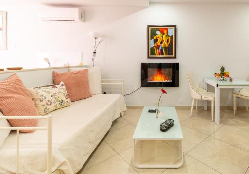 Un lugar para sentarse en Mesogios House Suites