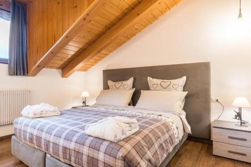 A bed or beds in a room at Casa Facco
