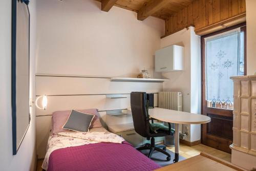 Katil atau katil-katil dalam bilik di Appartamento Albachiara 2