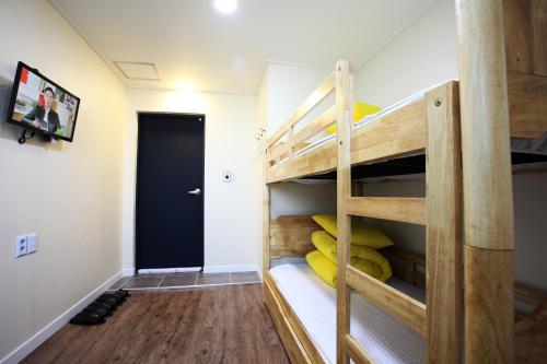 a room with a bunk bed and a hallway at 24 Guesthouse Myeongdong Avenue in Seoul