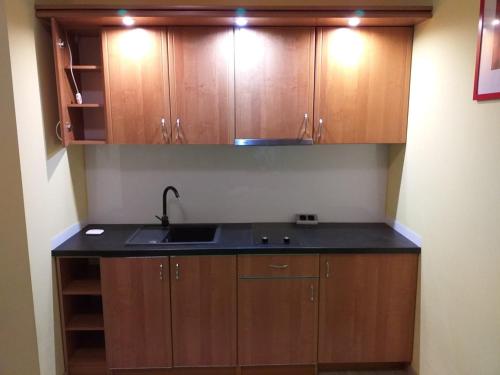 A kitchen or kitchenette at Apartament Portowa 29