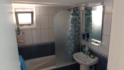 a bathroom with a sink and a shower and a toilet at 5 min to the Beach Holiday Shared Apartment - private ROOM in 3 bdr Apt in Larnaka