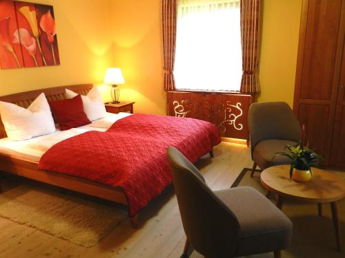 Ein Bett oder Betten in einem Zimmer der Unterkunft Landhaus am Bach