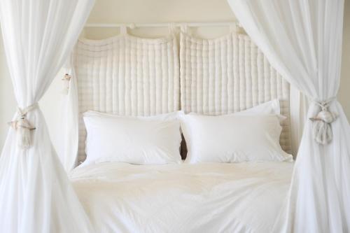 Aigis Suites Keaにあるベッド
