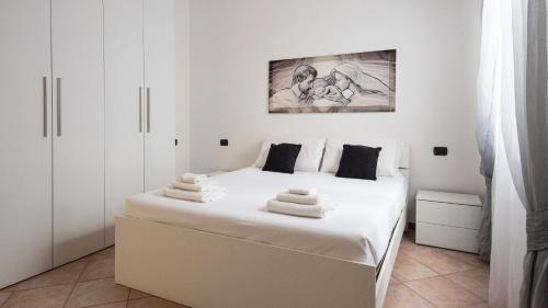 Ліжко або ліжка в номері Welcomely - Casa Peppe