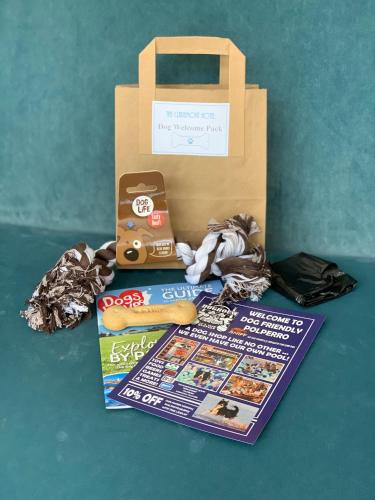 a paper bag and a magazine and a book at The Claremont Hotel-Adult Only in Polperro