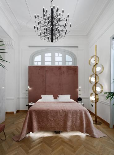 Una cama o camas en una habitación de Aristide Hotel - Small Luxury Hotels of the World