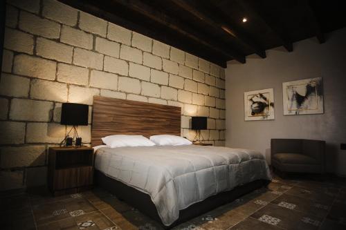 Łóżko lub łóżka w pokoju w obiekcie Real de Corralejo