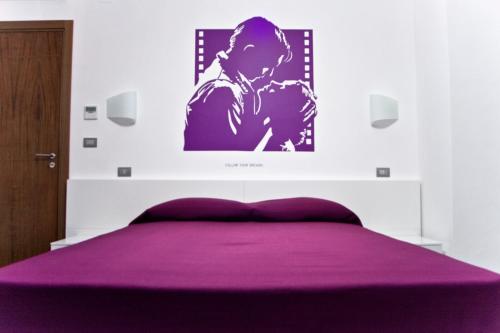Cama o camas de una habitación en inStile aparthotel