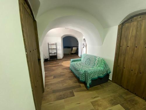 Postel nebo postele na pokoji v ubytování Cueva Ramón