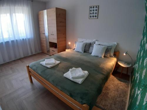 Krevet ili kreveti u jedinici u okviru objekta Apartments Manna Palic