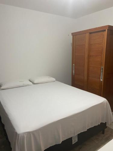 Una cama o camas en una habitación de Paraíso Flecheiras