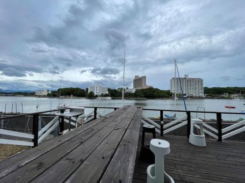a wooden dock with a view of a body of water at Marina Hotel Kaikuu - Vacation STAY 58502v in Kanayama