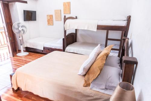 Postel nebo postele na pokoji v ubytování La Serrana Hostal Spa