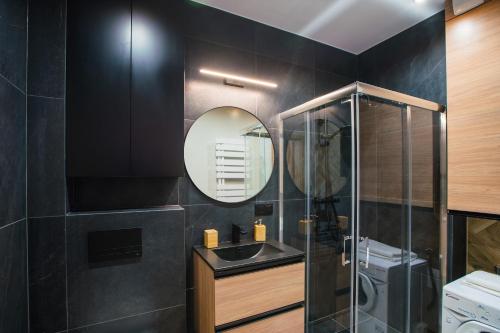 Ένα μπάνιο στο Beskid Apartment 15 z widokiem na Skrzyczne, Sauna, Jacuzzi