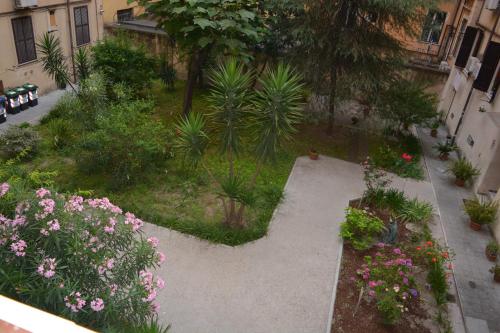 an overhead view of a garden with flowers and plants at Rome Lucia Apartment in Rome