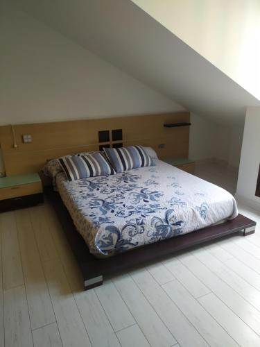 Postel nebo postele na pokoji v ubytování Apartamento Castelao illa de arousa