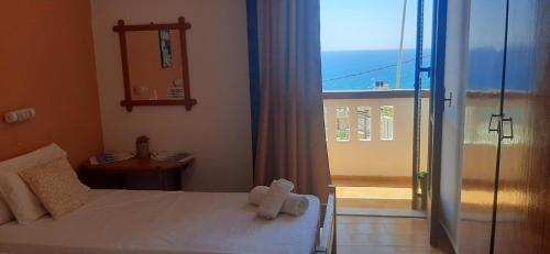 Ένα ή περισσότερα κρεβάτια σε δωμάτιο στο Villa Mare 