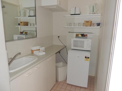 Η κουζίνα ή μικρή κουζίνα στο Comfort Inn Premier