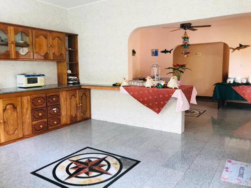 Kuchyň nebo kuchyňský kout v ubytování Villa Bananier