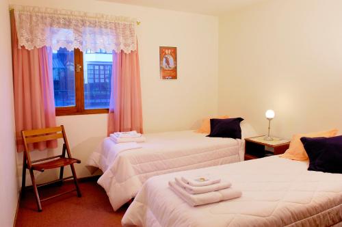 Postel nebo postele na pokoji v ubytování Tango B&B