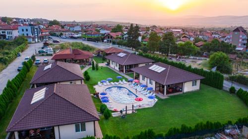 an aerial view of a house with a swimming pool at Вилен комплекс Дарибел in Sapareva Banya