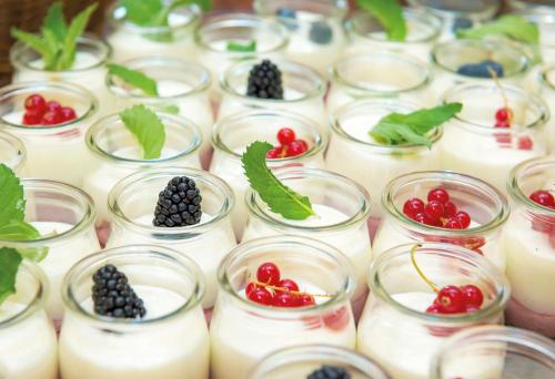 a group of jars filled with fruit and candles at RETTER Bio-Natur-Resort in Pöllauberg