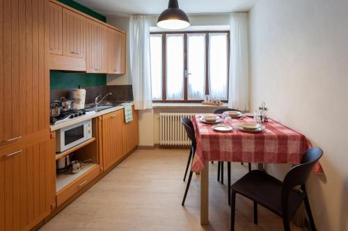 Kuchyň nebo kuchyňský kout v ubytování Il Fauno
