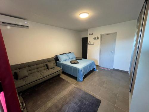 Χώρος καθιστικού στο Papeete Guest Studio