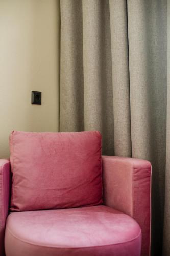 Un lugar para sentarse en Leone Suites