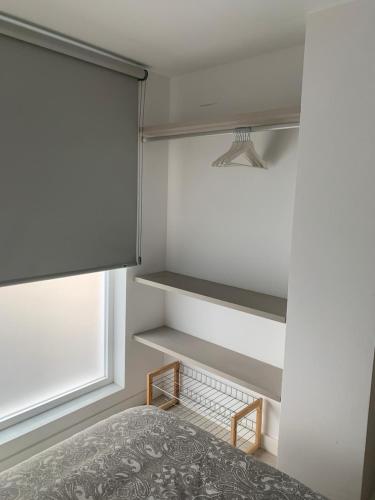 Ένα ή περισσότερα κρεβάτια σε δωμάτιο στο Hostal Acemar