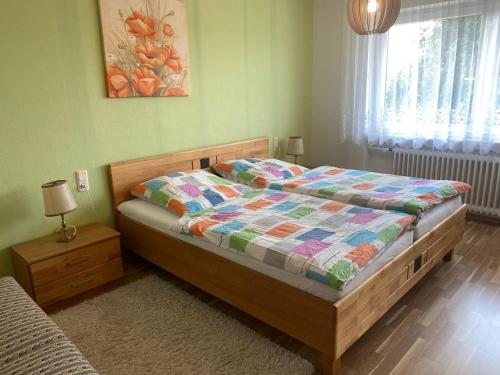 Postel nebo postele na pokoji v ubytování Ferienwohnung Fackelmann