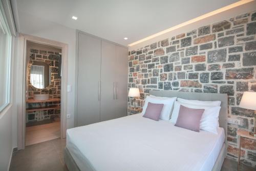 Postel nebo postele na pokoji v ubytování Acantha Villas